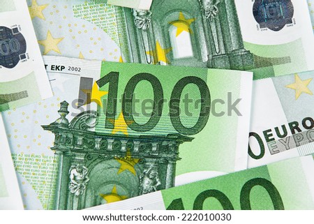 many hundreds of euro notes are next to each other