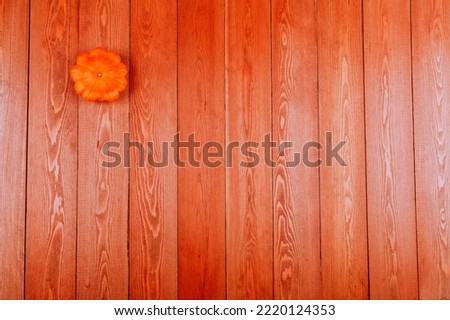 Still life with mini squash for squash.Space for text.On a wooden background.meal.Thanksgiving day.the concept of fresh vegetables.close-up.Copy space on a wooden background.