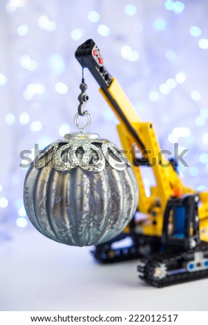 christmas decoration with boys toys over glitter background