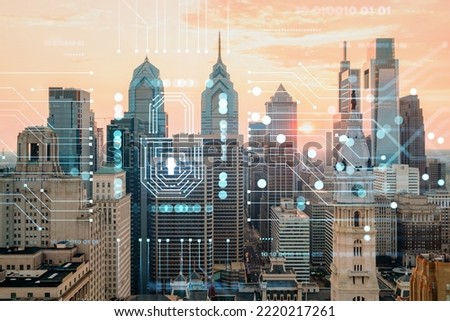 Aerial panoramic cityscape of Philadelphia financial downtown, Pennsylvania, USA. City Hall Clock Tower, sunset. Padlock hologram. The concept of cyber security to protect confidential information