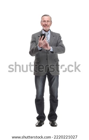 Happy old man in suit and falling dollar banknotes