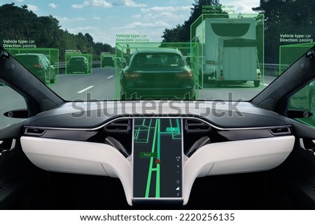 Self driving car on a road. Autonomous vehicle. Inside view. Royalty-Free Stock Photo #2220256135