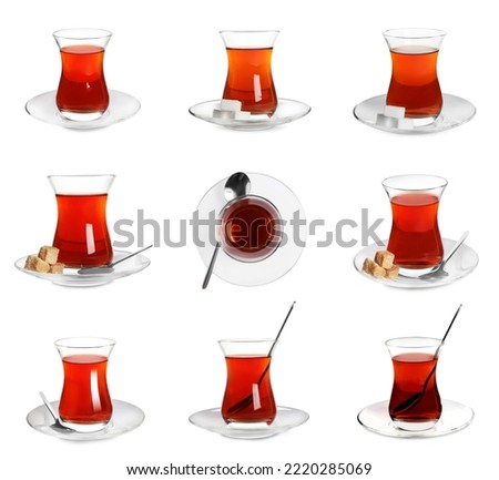 Set with glasses of traditional Turkish tea on white background