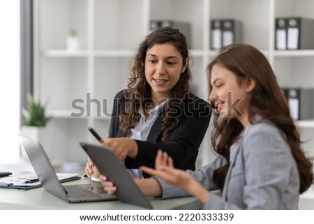 Fund managers team consultation and discuss about analysis Investment stock market by digital tablet Royalty-Free Stock Photo #2220333339