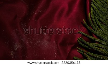 Christmas background with green leaves. Holiday copy space layout.