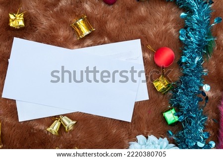 Rectangle christmas greeting cards mockup image. A blank white paper decorated with a lot of christmas ornaments, colorful gift boxes. Blank space to fill. Christmas paper mockup image