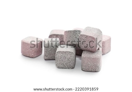 Heap of soluble tablets on white background