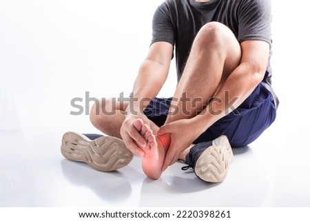 Elderly men or women or young people have knee, ankle, joint pain, arthritis, and tendon problems. exercise-induced muscle pain from gout and uric acid isolated on white background Royalty-Free Stock Photo #2220398261