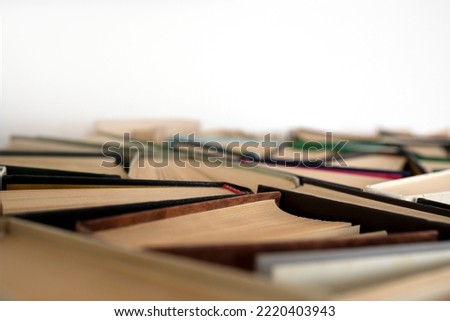background from many books. Book view from above.  reading culture. books copy space. blurry picture