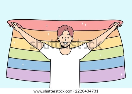 Smiling young man with LGBTq flag show support on pride parade. Happy guy express freedom of love. Homosexuality concept. Vector illustration.  Royalty-Free Stock Photo #2220434731