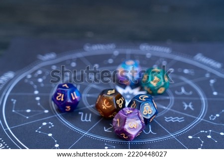 Horoscope zodiac circle with divination dice. Fortune telling and astrology predictions concept, magic rituals and exoteric experience Royalty-Free Stock Photo #2220448027