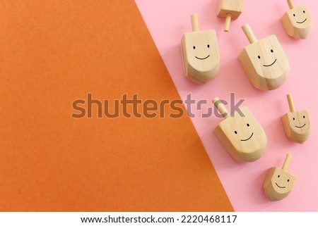 Image of jewish holiday Hanukkah with wooden dreidels collection (spinning top)