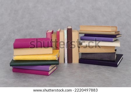 Stack of book on gray background