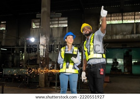African male chief engineer Working in the old factory to rehearse the engine