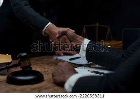 Businessman and Lawyer handshaking after good deal. Law, legal services, advice, Justice concept