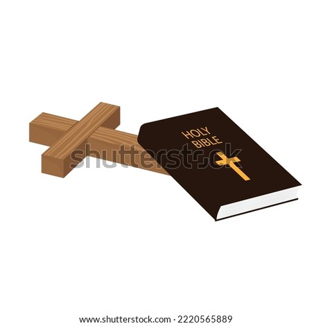 Christian wooden cross lies next to the bible book