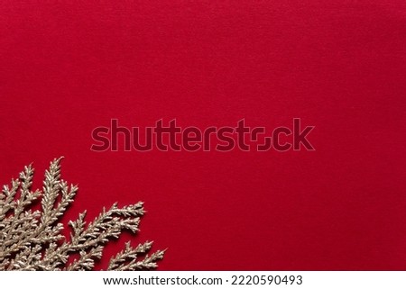 Minimalistic christmas decoration on red background	