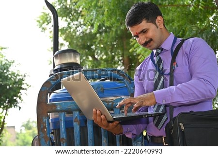 Portrait of an Indian insurance agent at village