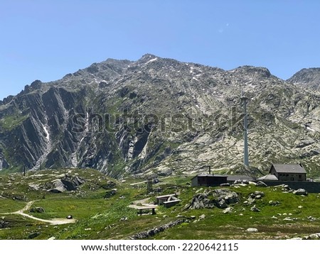 Rocky mountain peaks Poncione di Fieud (2696 m) and Fibbia (2738 m) in the massif of the Swiss Alps above the St. Gotthard Pass (Gotthardpass), Airolo - Canton of Ticino (Tessin), Switzerland (Schweiz Royalty-Free Stock Photo #2220642115
