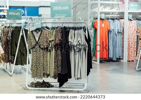 Seasonal Clothing sale on hanger at the modern shop, mass market. Make Outfit set. Shopping Mall. Shopper. Sales. Shopping Center. Selective focus, space for text
