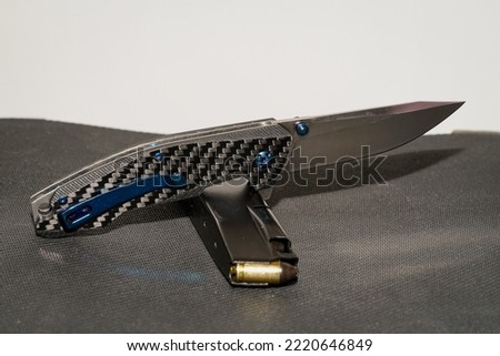 Folding knife, close up photo.