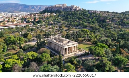 Aerial drone photo of iconic Temple of Hephaestus one of the most well preserved in Greece and Acropolis hill at the background, Athens historic centre, Attica, Greece Royalty-Free Stock Photo #2220650817