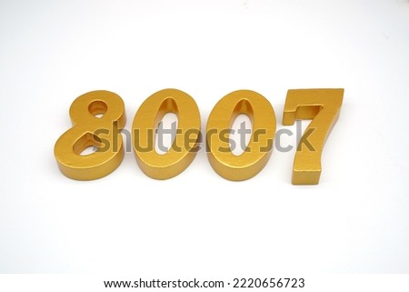 Number 8007 is made of gold-painted teak, 1 centimeter thick, placed on a white background to visualize it in 3D.                                
