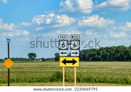 Ohio's Highway 6 East and West signs with directional arrows. Ohio, USA.