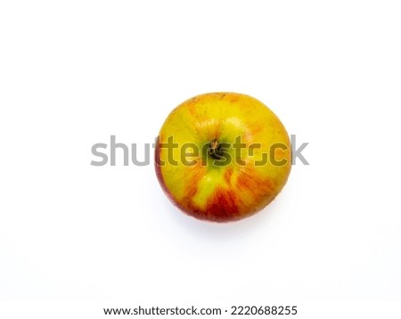 Birds eye view at healthy fresh apple isolated on white background as an example for vegetarian nutrition. Royalty-Free Stock Photo #2220688255