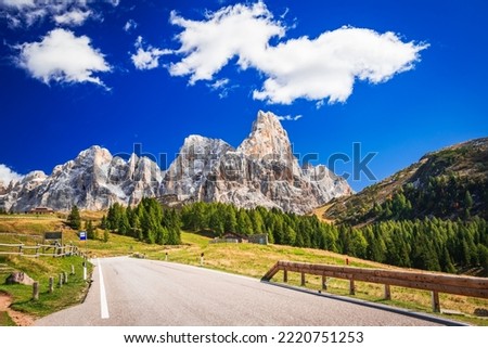 Passo Rolle, Italy. Breathtaking autumn scenics Dolomite Alps, with mount Cimon della Pala (3184 m). Landscape of Sudtirol, Trentino Alto-Adige italian region. Royalty-Free Stock Photo #2220751253