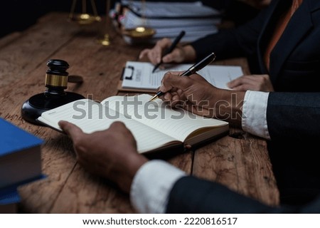 Group of Lawyer working and discussing in office workplace for consultant lawyer concept. Law, legal services, advice, Justice concept