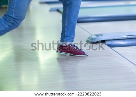 Bowling.A man is playing bowling.Recreation and entertainment.