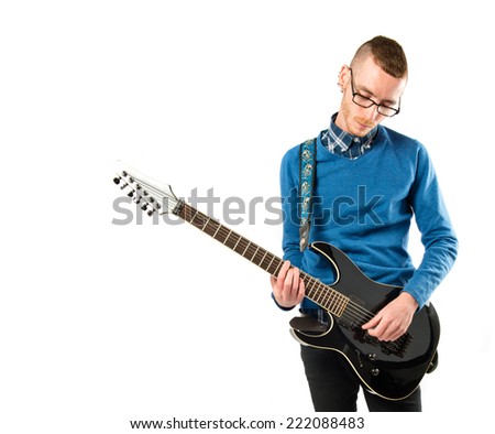 Man with guitar over white background