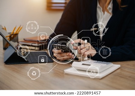 Digital marketing media in virtual screen.businesswoman hand working with mobile phone and modern compute with VR icon diagram at office