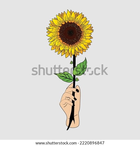Sunflower with a hand-held decoration and a vintage background