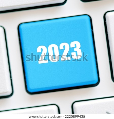 2023 year on the blue key of the computer keyboard.