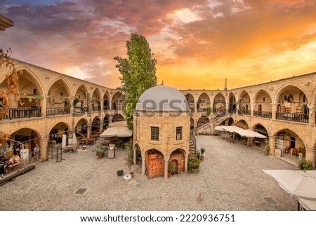 The Great Inn, Nicosia, North Cyprus. Ancient Ottoman architecture. Antique arch building. Royalty-Free Stock Photo #2220936751