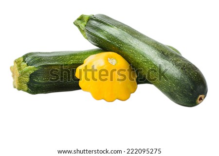 Green and yellow squash and zucchini on a white background
