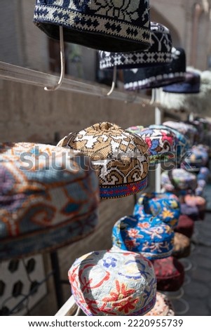 Traditional Uzbek colorful headwear on the market stand Royalty-Free Stock Photo #2220955739