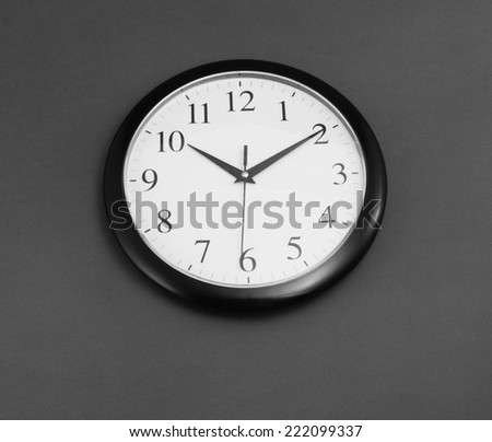 Classic clock on gray background