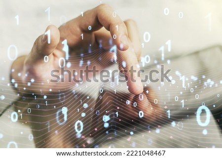 Creative abstract binary code hologram and finger presses on a digital tablet on background, AI and machine learning concept. Multiexposure