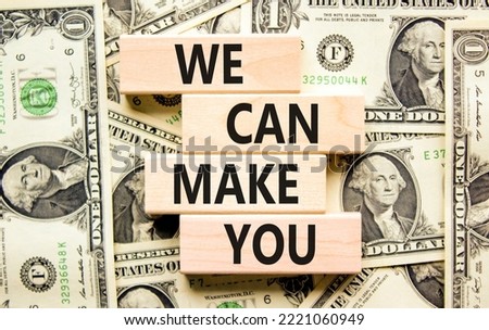 Support and we can make you symbol. Concept words We can make you on wooden blocks. Beautiful background from dollar bills. Business, psychological we can make you concept. Copy space.