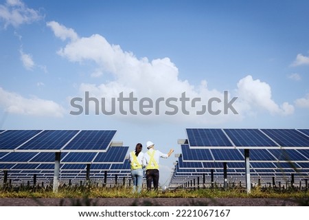 Inspector engineering concept; Engineer inspect solar panel  at solar power plant 
