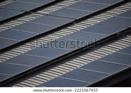 Solar panels at sunset,Solar panel, photovoltaic, alternative electricity source - concept of sustainable resources,Sunset rays over a photovoltaic power plant,Thailand.