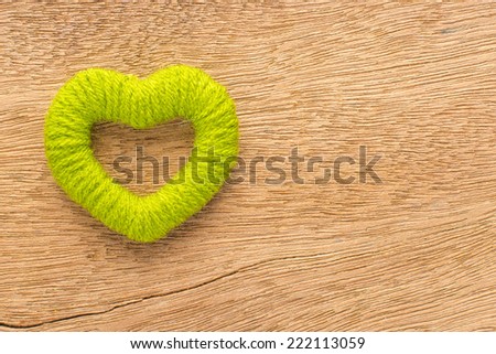 green heart on wood