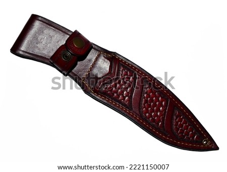 Handcrafted leather knife sheath on a white background,knife sheath,top view photo. Royalty-Free Stock Photo #2221150007