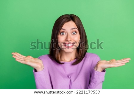 Closeup photo of young crazy attractive girl hold two hands objects which better isolated on green color background