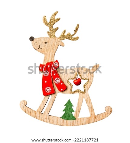 decorated wooden christmas reindeer figure on white background