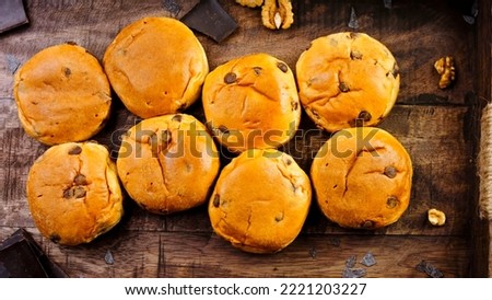 Many briochettes arranged on a wooden background