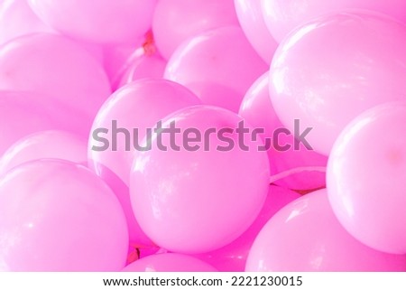 Blurred image, pink balloons stacked on top of each other. image for background